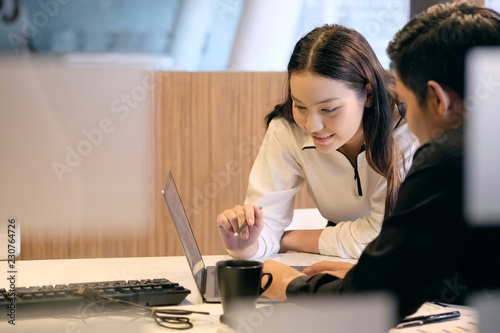 apprentice Intern teenage woman study business finance with senior staff.