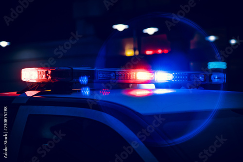 Closeup of Police Lights on Dark Street at Night