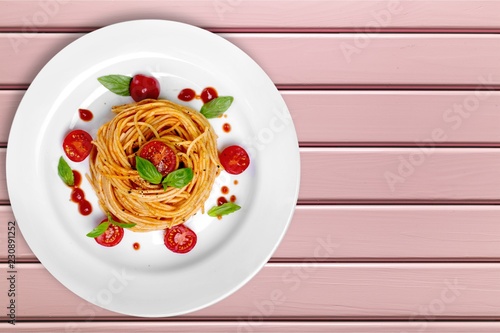 Delicious pasta on white plate on background