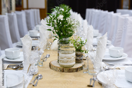 Wedding decor table setting and flowers.