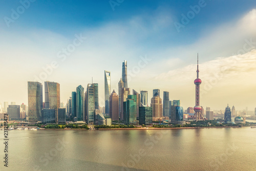 Aerial view on Shanghai, China. Beautiful daytime skyline with skyscrapers and the Hunapu river.