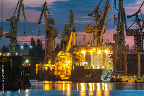 industrial areas, shipyard and port after sunset - Szczecin, Poland
