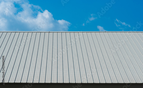 Metal sheet for industrial roof and blue sky.