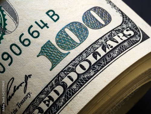 Close up of stack of 100 dollar bills