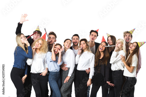 Beautiful people having fun on a white background. Concept celebrating New Year or Christmas.