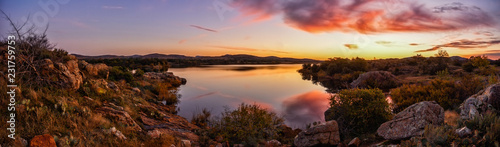 sunrise over a lake in oklahoma