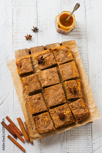 Spicy Pumpkin Сbars Blondie Squares with Cinnamon, Anise and Caramel. Traditional English Dessert. Top view.