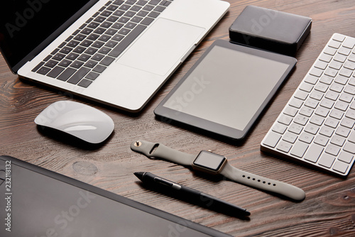 close-up shot of different modern gadgets on cg artist workplace