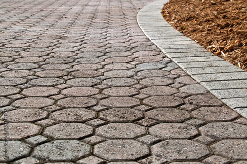 low angle brick paver driveway