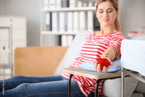 Woman donating blood in hospital