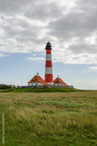 Westerheversand lighthouse surrounded by salt marshes, Eiderstedt, Germany