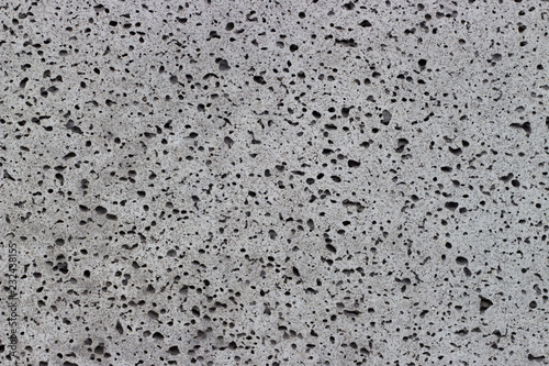 Gray porous foam closeup, texture background