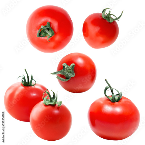 Red tomatoes on a white background. View from above. Cherry tomatoes.