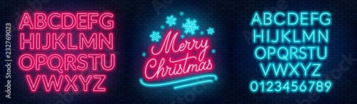 Neon sign merry christmas on a dark background with bright alphabets.