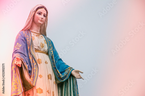 Virgin Mary statue with colourful background, Jesus christ mother.