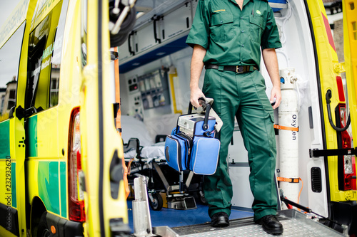 Paramedics at work with an ambulance