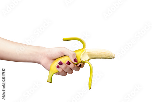 Woman hand holding banana for illustration of premature ejaculation or sexual dysfuncion