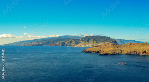 Panoramic view of aride volcanic Madeira island shoreline in Portugal.