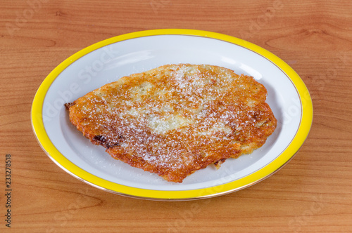 Polish placki ziemniaczane with sugar. Potato pancakes, latkes, deruny or boxties
