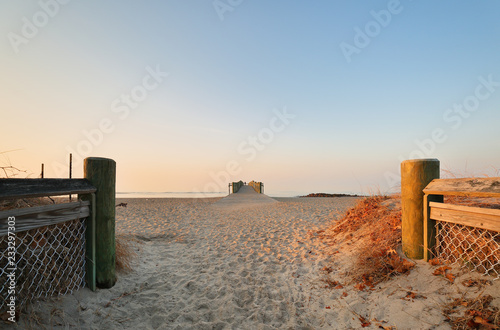 Overview of the entrance of Walnut Beach at sunrise Milford Connecticut, USA. Walnut Beach is a great place to spend the day strolling along the edge of the Long Island Sound or fishing from the pier.