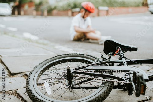 Young boy knocked off his bike