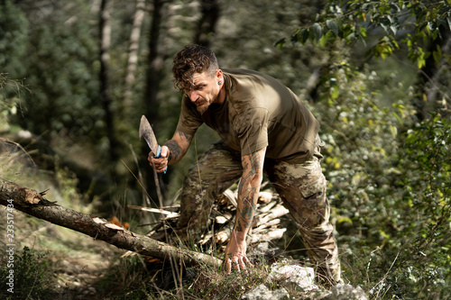 Young woodcutter in the woods