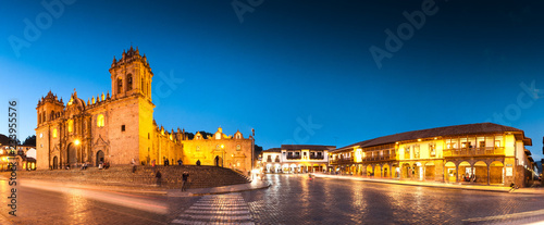 Cuzco, Peru: Panoramic view of Cathedral church and city at night.