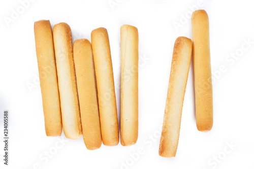 bread sticks top view on white background.