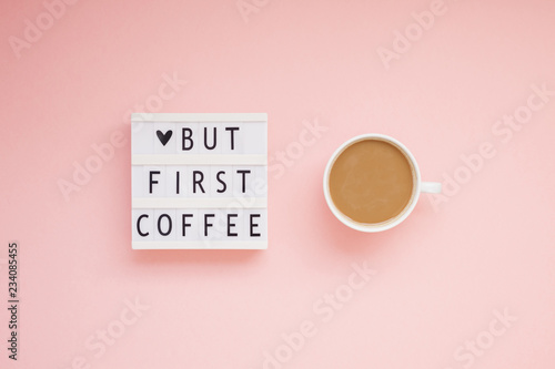 But first coffee text on lightbox with Coffee Cup