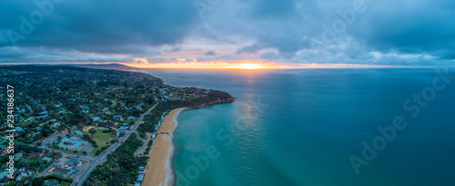 Beautiful ocean coastline at sunset in Melbourne, Australia - aerial panorama