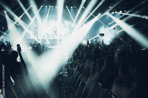 MINSK, BELARUS - 20 SEPTEMBER, 2018: Crowd at concert - retro style photo