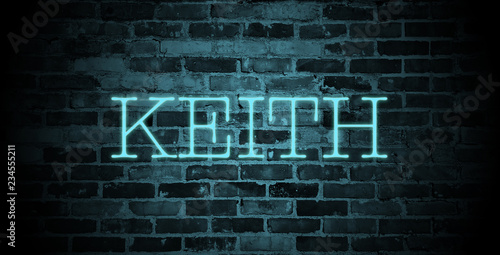 first name Keith in blue neon on brick wall