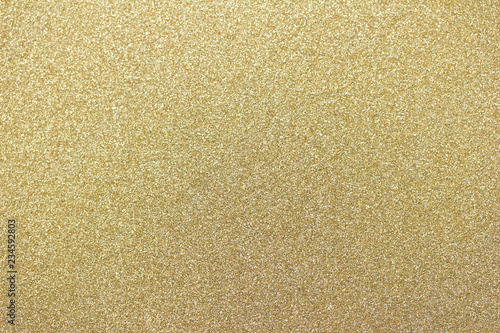 Sparkling macro gold glitter bokeh abstract background
