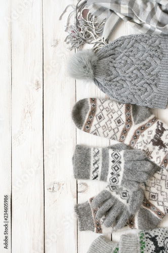 Warm woolen knitwear on wood
