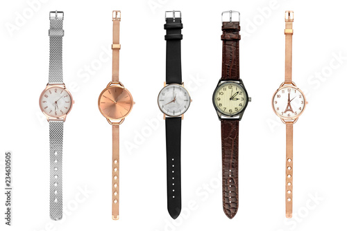 Woman stylish watches. Set of five female watches of various sizes and designs, isolated on white background, clipping paths included.