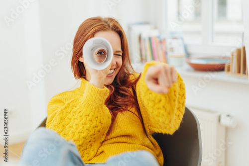 Playful young woman playing I Spy