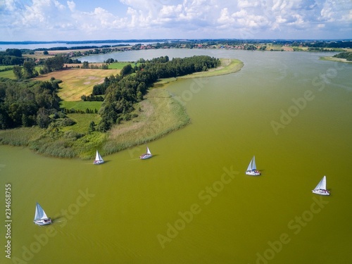Aerial view of yachts sailing on Swiecajty Lake, Mazury, Poland