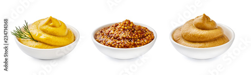 Mustard in bowls. Set of sauce isolated on white background.