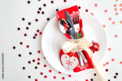 Christmas table place setting. Holidays background, top view, space for text
