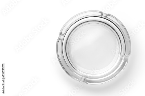 Round glass ashtray isolated on white background. Top view.