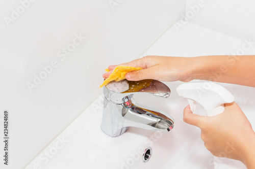 cleaning the faucet cleaning products. The cleanliness in the house.