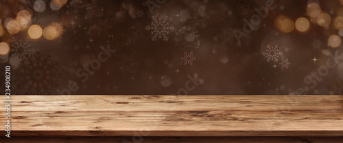 Wooden table with christmas background