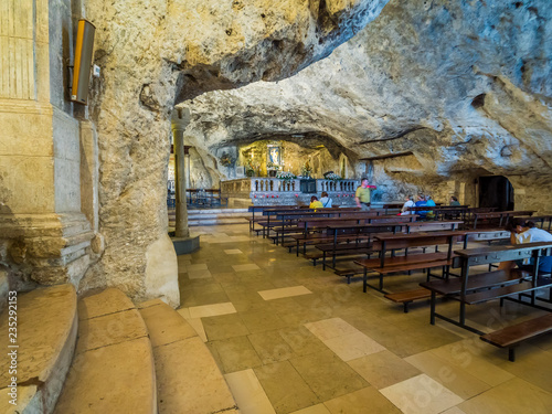 Apulia, Italy - Jul 17, 2018: Inside the shrine of the Sanctuary of San Michele Arcangelo, Monte Sant Angelo, an important pilgrimage site since the early Middle Ages