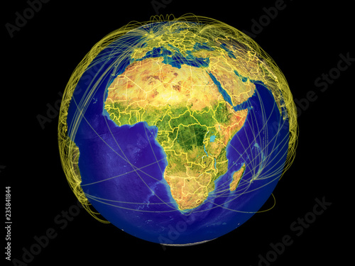 Africa from space on Earth with country borders and lines representing international communication, travel, connections.