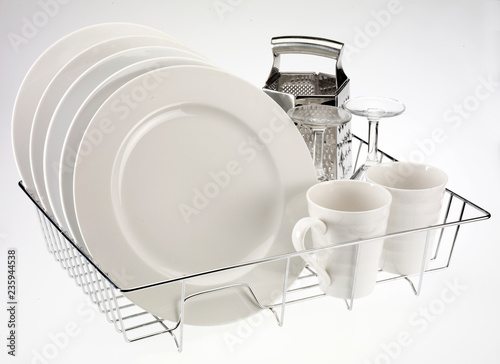 DISH RACK WITH CLEAN WASHED DISHES