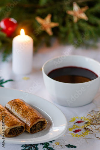 Polish Christmas borscht with mushroom and cabbage pastry homemade