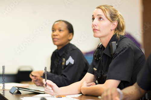 Policewomen in classroom