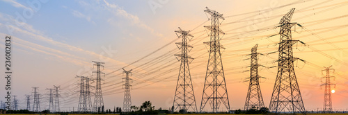 high-voltage power lines at sunset,high voltage electric transmission tower