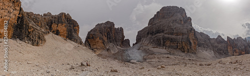 Mountaineers equipped face the "Bocchette Alte" ferrata in the Brenta group on the Dolomites, in Italy