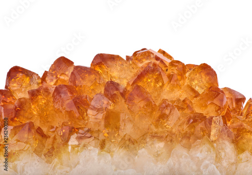 bright orange citrine crystals isolated on white